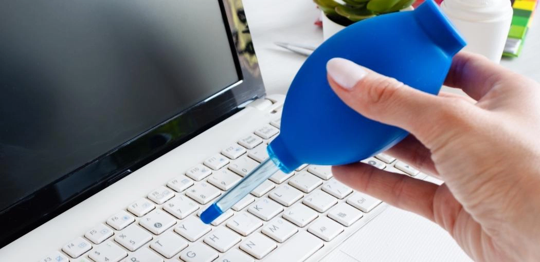 Step seven: Dry the keyboard with compressed air and turn it back over: