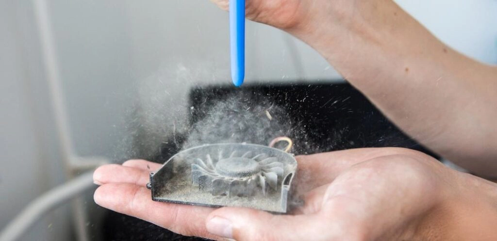 Step three: Use canned air to blow out dust from hard-to-reach areas