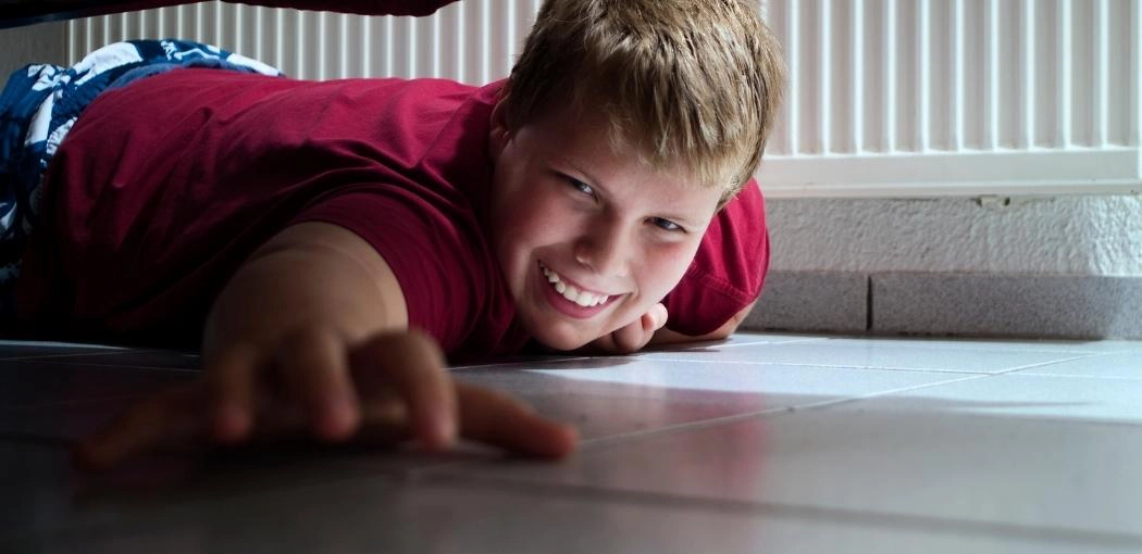 How to Hide a Laptop from Parents: Hide your laptop under the bed
