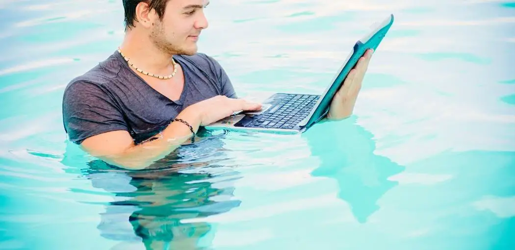 How to Use a Laptop in a Pool: Keep the power cord dry
