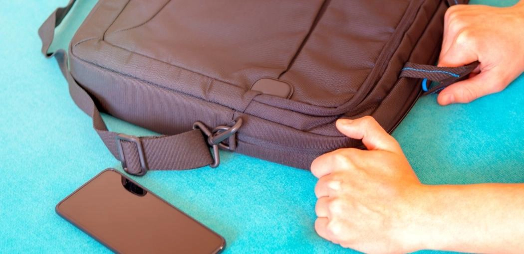 How do I remove a coffee stain from my laptop bag?