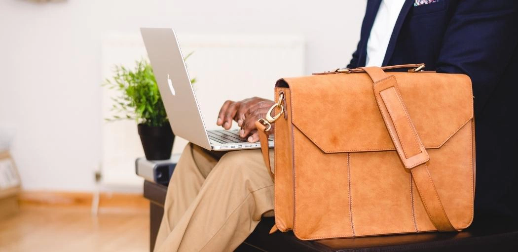 How do you clean a leather laptop bag?