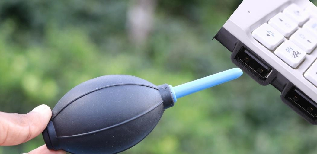 Step three: Use compressed air to clean out the dust